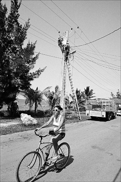 power-pole-workers-w-bike-Playa-Baracoa.jpg