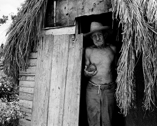 180-man-farm-shack-doorway-w-mango