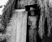 180-man-farm-shack-doorway-w-mango