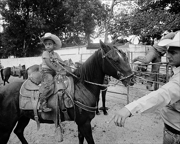 little-boy-on-horse-in-chute-rodeo-Sancti-Spiritus