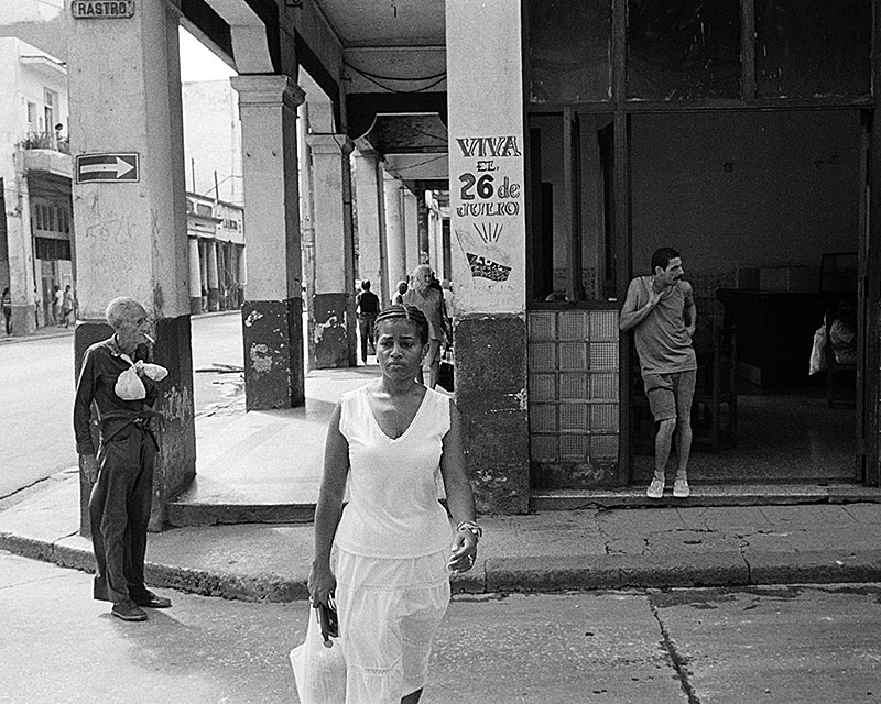 lady-crossing-street-corner