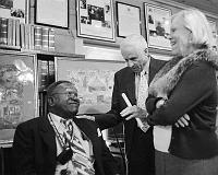  William Gladden, member of one of South Apopka founding famiies, being congratulated by Apopka Mayor John Land after speech at Apopka Historical Society.