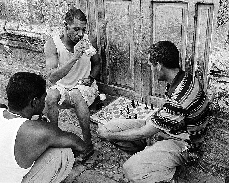 men-playing-chess-drinking-.jpg