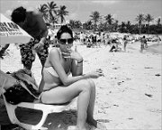 woman-smoking-at-beach